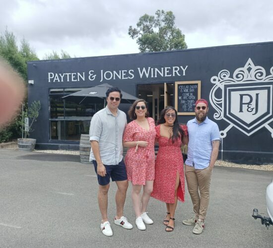 Two Couples In Front Of The Payten And Jones Winery