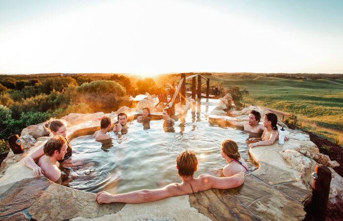 The team enjoys a natural pool during Mornington Peninsula Wine Tours