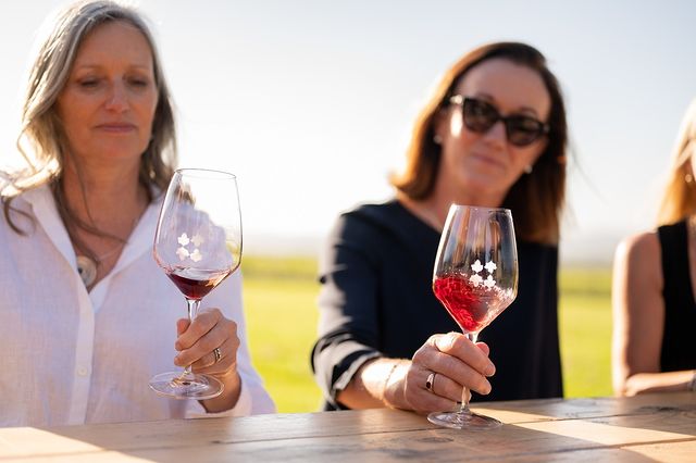 Women tasting wine during private winery tours Yarra valley
