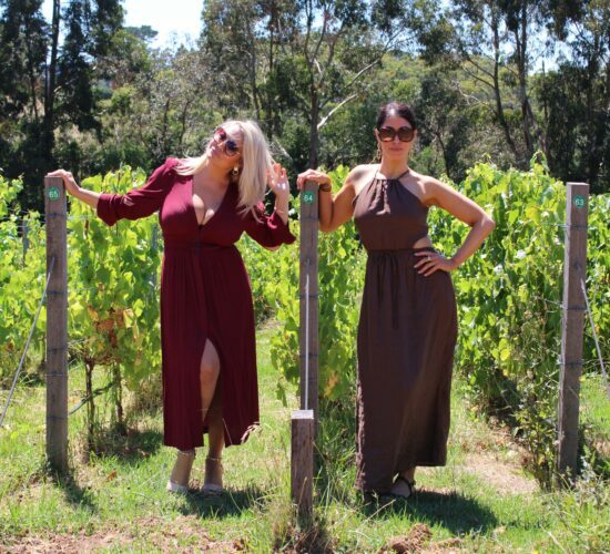 Two Girls Facing For A Photo While They Are On Their Winery Tours Victoria