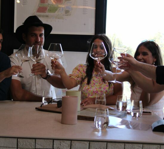 Group Cheering While Tasting Wine At Yarra Valley Winery Restaurants