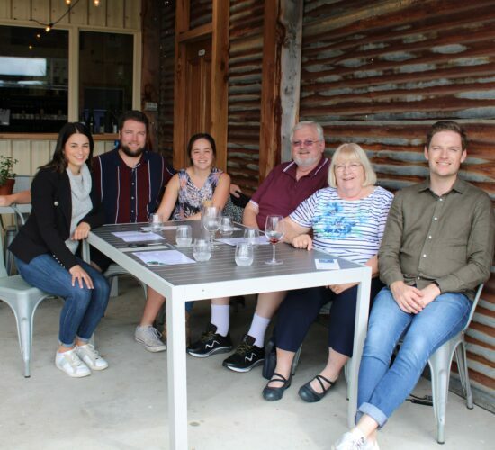 The family enjoy wine while on their Melbourne wine tours